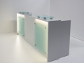 Empfangstheke lichtgrau mit satiniertem Glas, Edelstahladaptern und LED-Beleuchtung